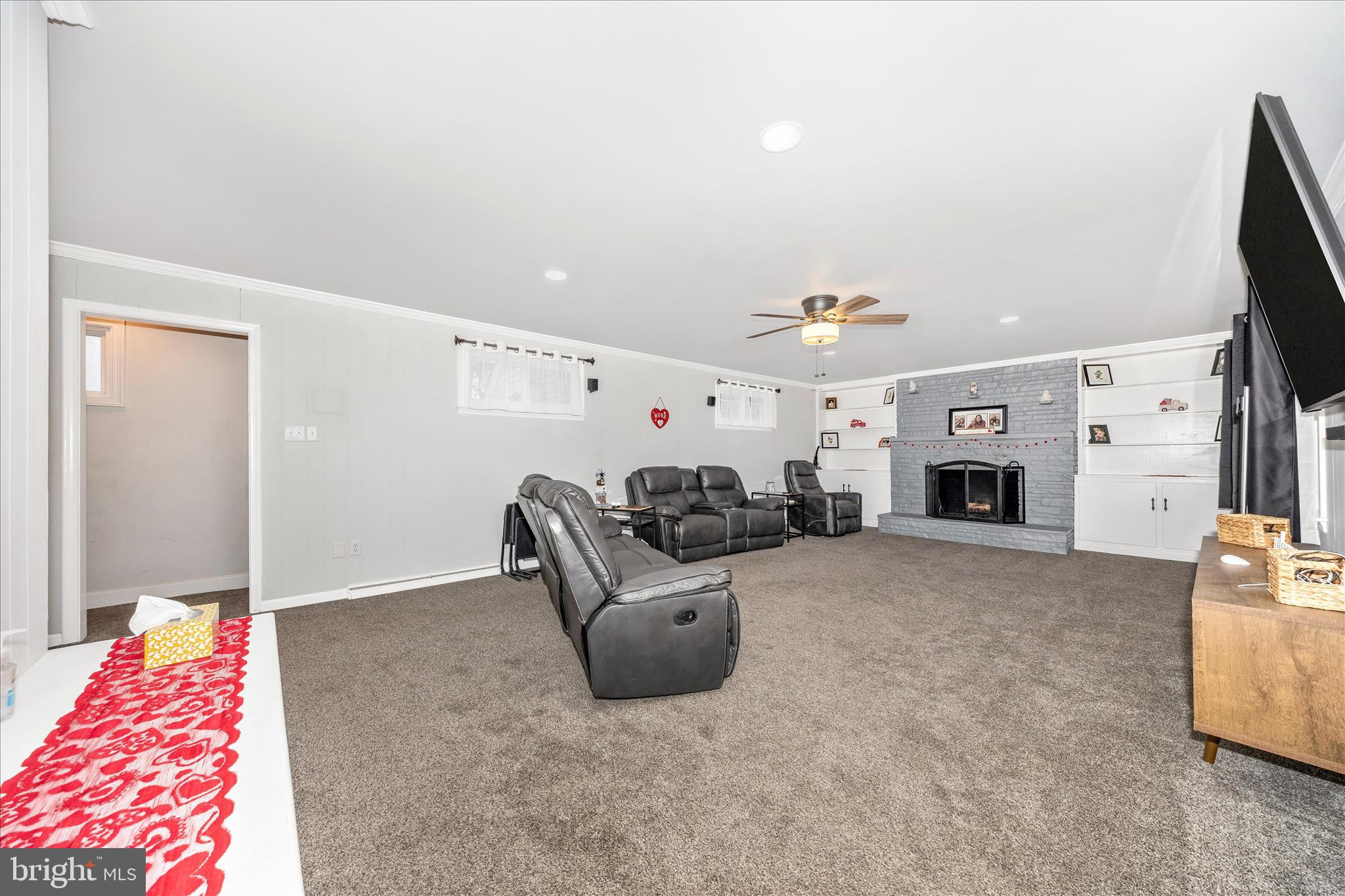 18826 Preston Road Hagerstown, MD 21742 - Photo 20 of 60 a living room with furniture and a fireplace