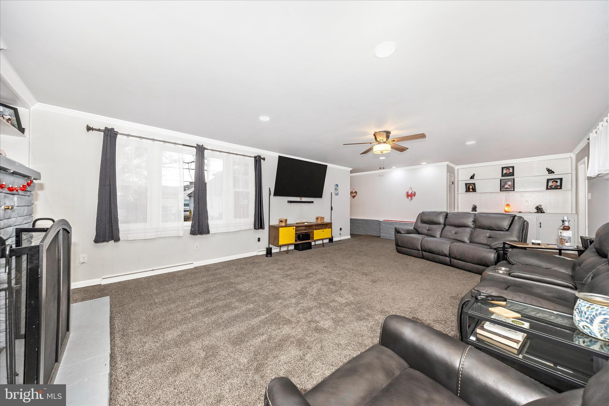 18826 Preston Road Hagerstown, MD 21742 - Photo 22 of 60 a living room with furniture and a flat screen tv