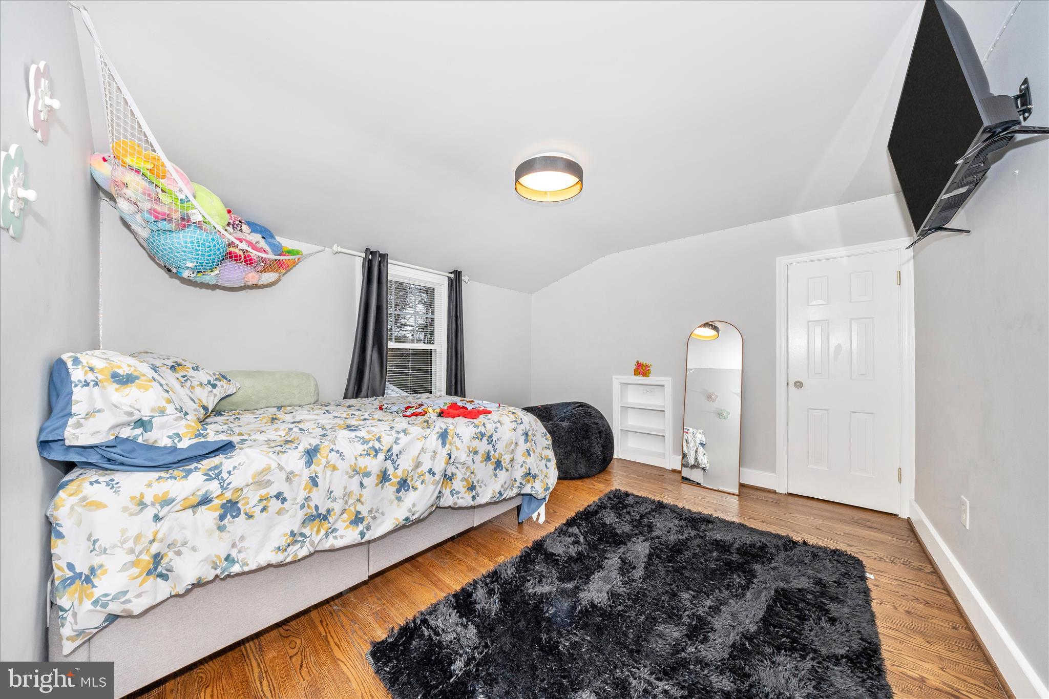 18826 Preston Road Hagerstown, MD 21742 - Photo 33 of 60 a bedroom with bed and wooden floor