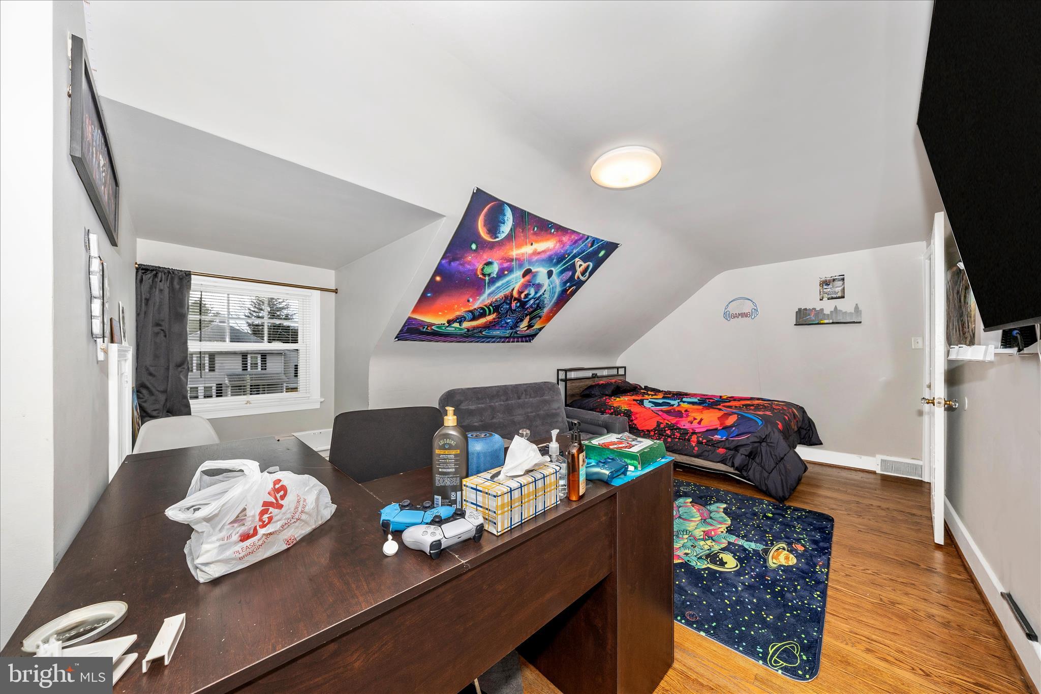 18826 Preston Road Hagerstown, MD 21742 - Photo 36 of 60 a living room with furniture and a floor to ceiling window
