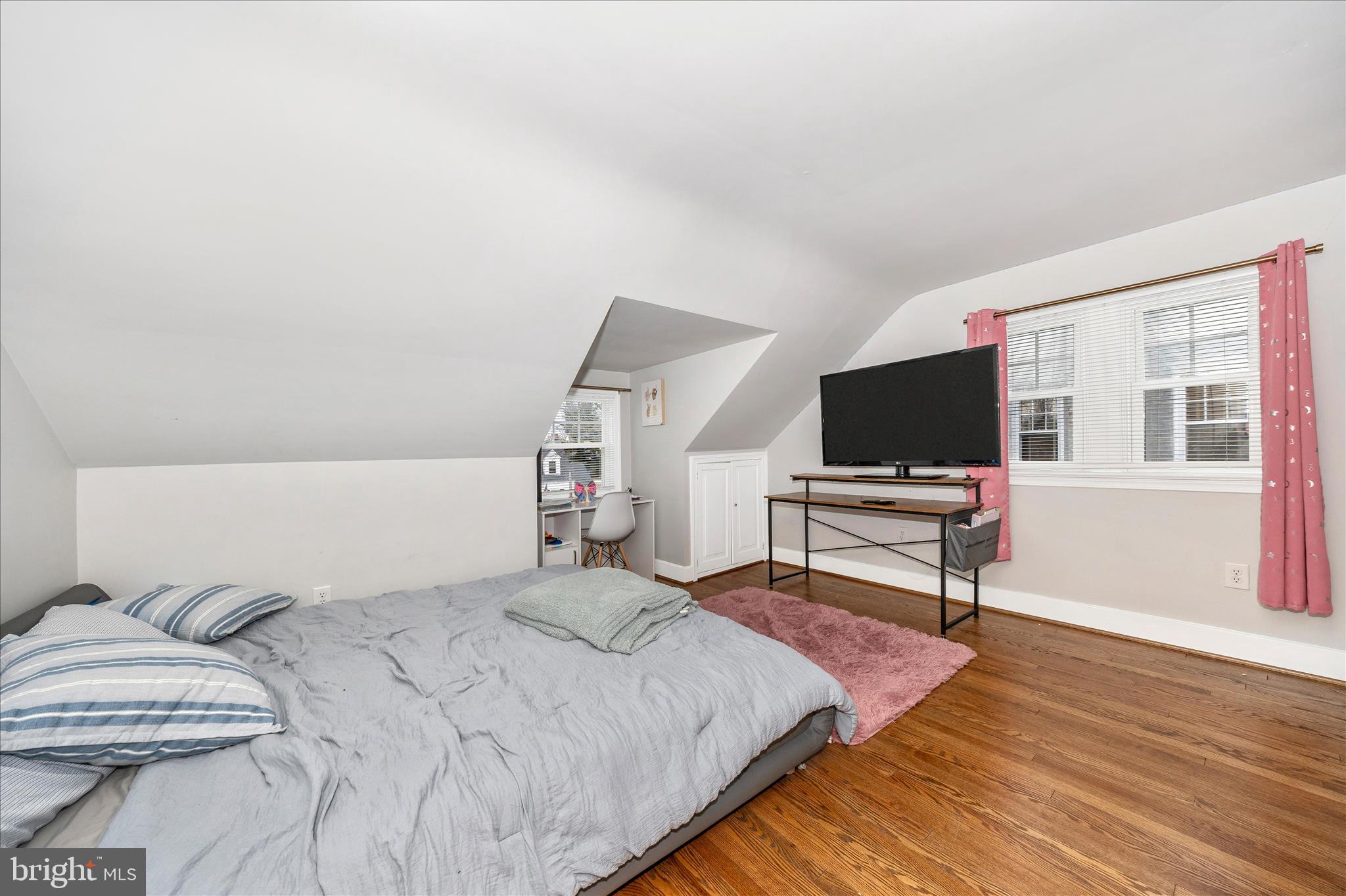 18826 Preston Road Hagerstown, MD 21742 - Photo 38 of 60 a bedroom with a bed and a flat screen tv