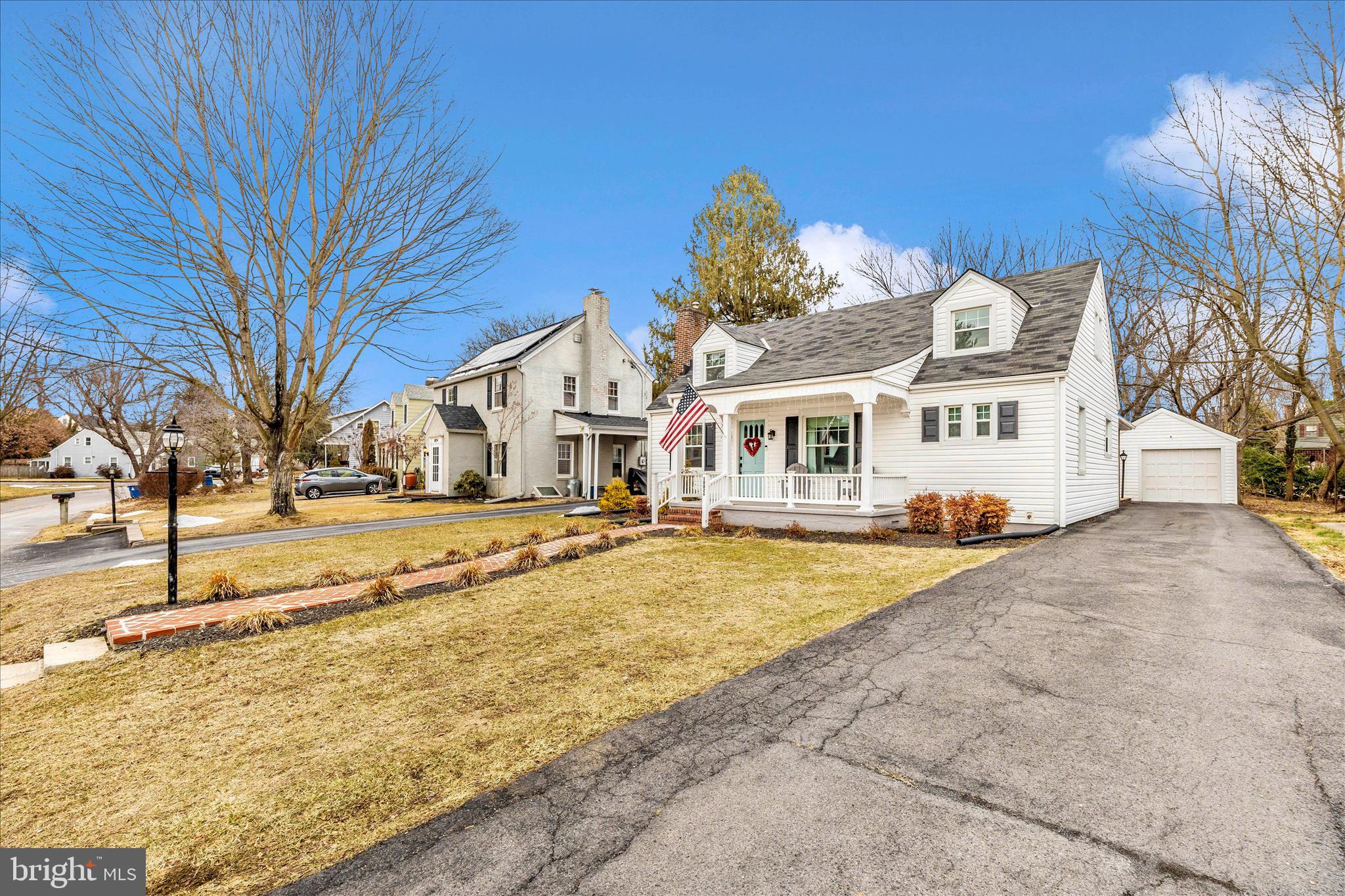 18826 Preston Road Hagerstown, MD 21742 - Photo 45 of 60 a view of a white house with a yard covered in snow