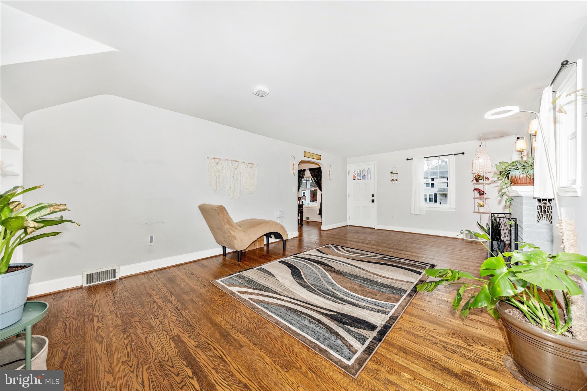 18826 Preston Road Hagerstown, MD 21742 - Photo 6 of 60 a living room with furniture and a potted plant
