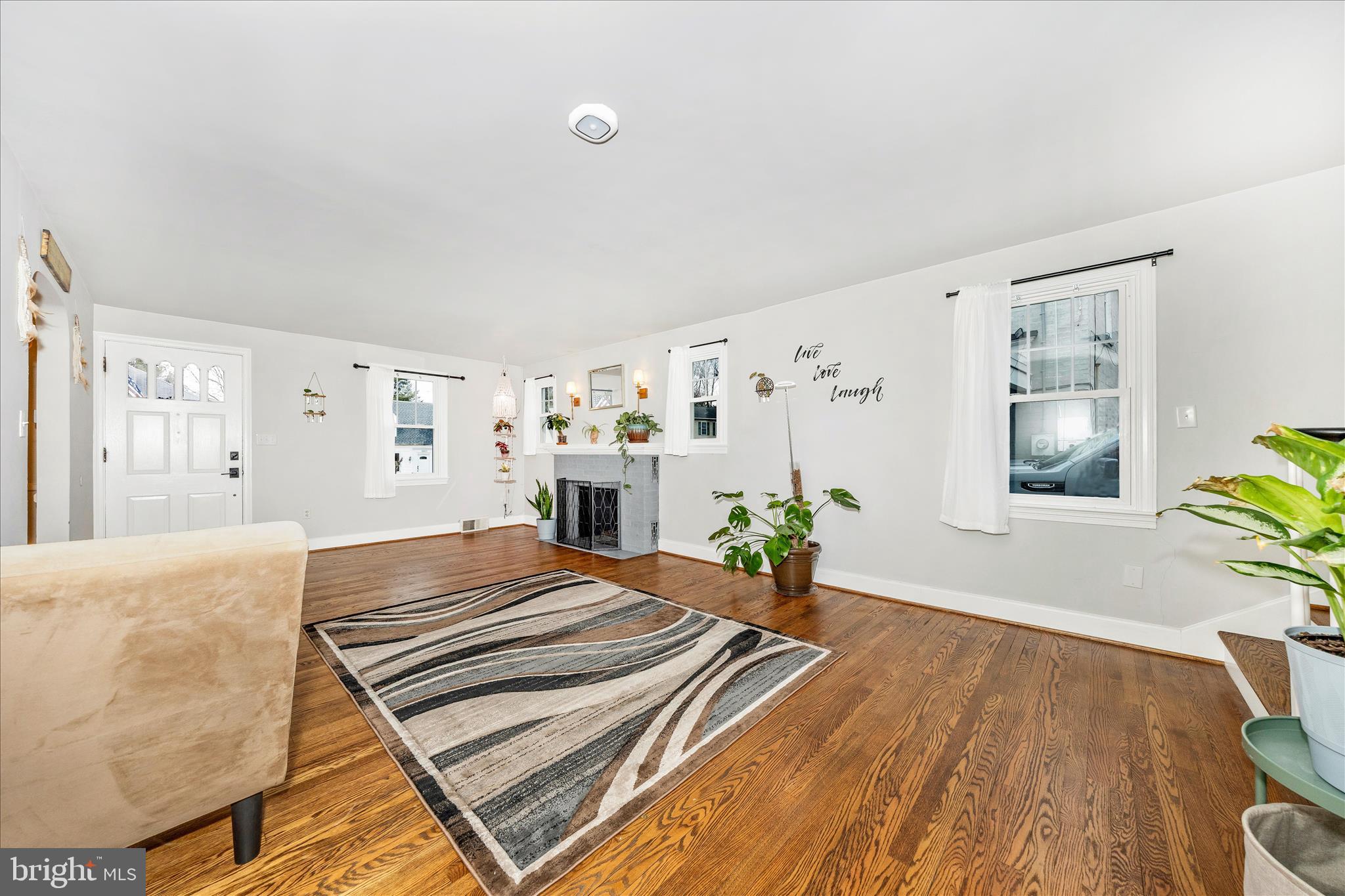 18826 Preston Road Hagerstown, MD 21742 - Photo 7 of 60 a bedroom with a bed and a dresser with wooden floor