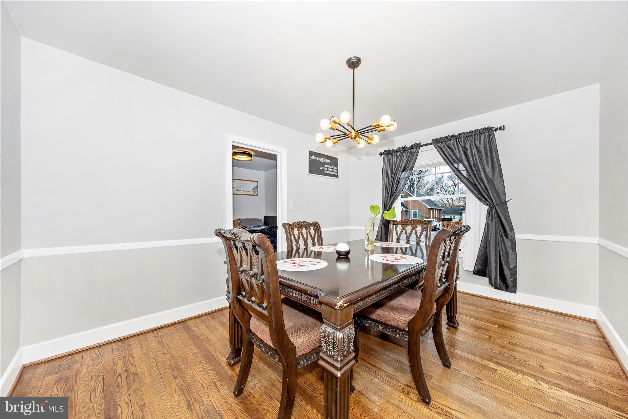 18826 Preston Road Hagerstown, MD 21742 - Photo 9 of 60 a view of a dining room with furniture and wooden floor