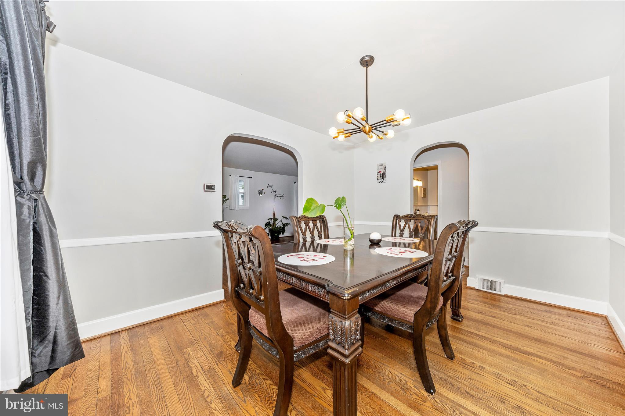 18826 Preston Road Hagerstown, MD 21742 - Photo 10 of 60 a view of a dining room with furniture and wooden floor