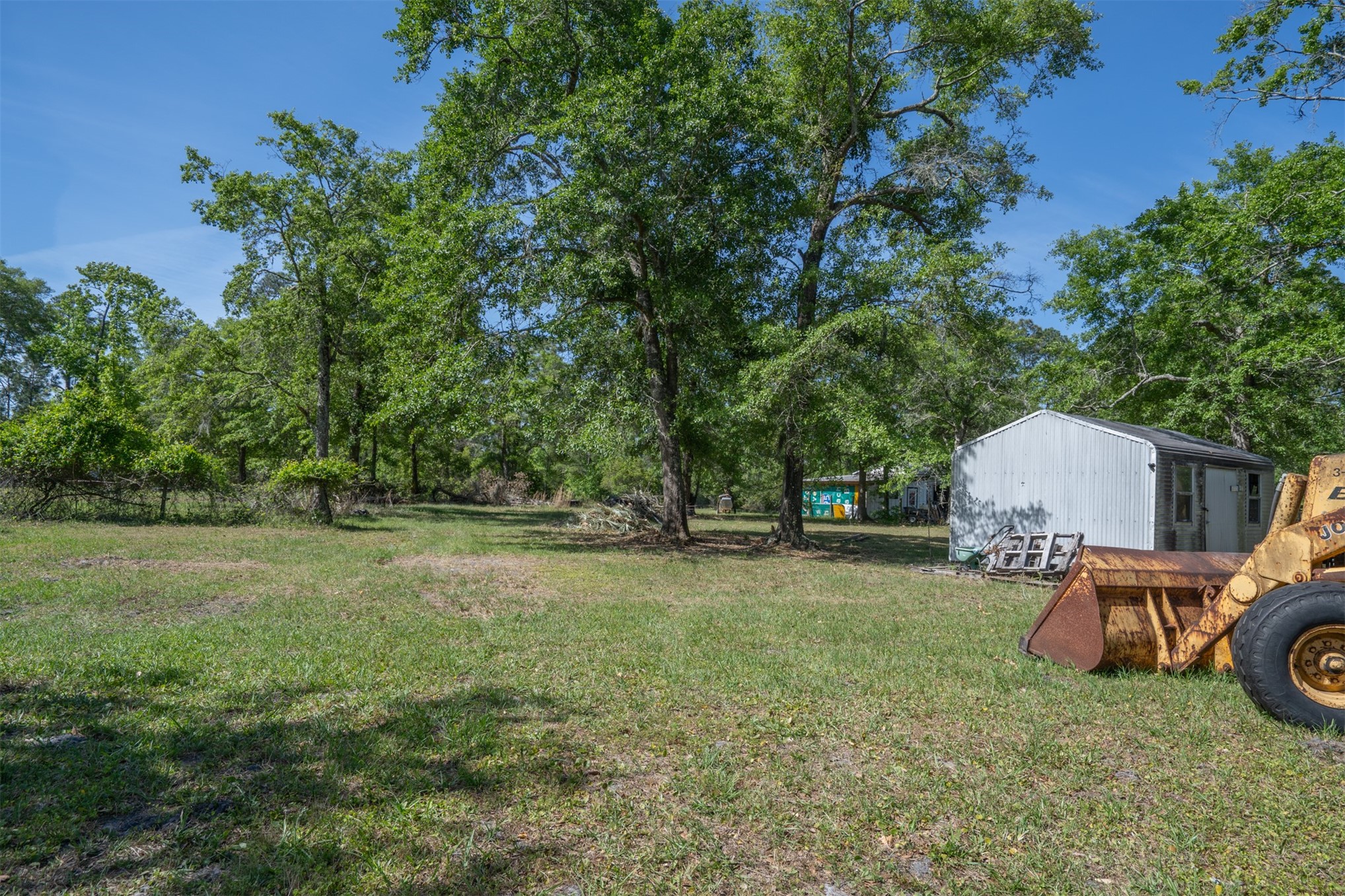 76220 Dove Road Yulee, FL 32097 - Photo 39 of 48 a view of a backyard with furniture