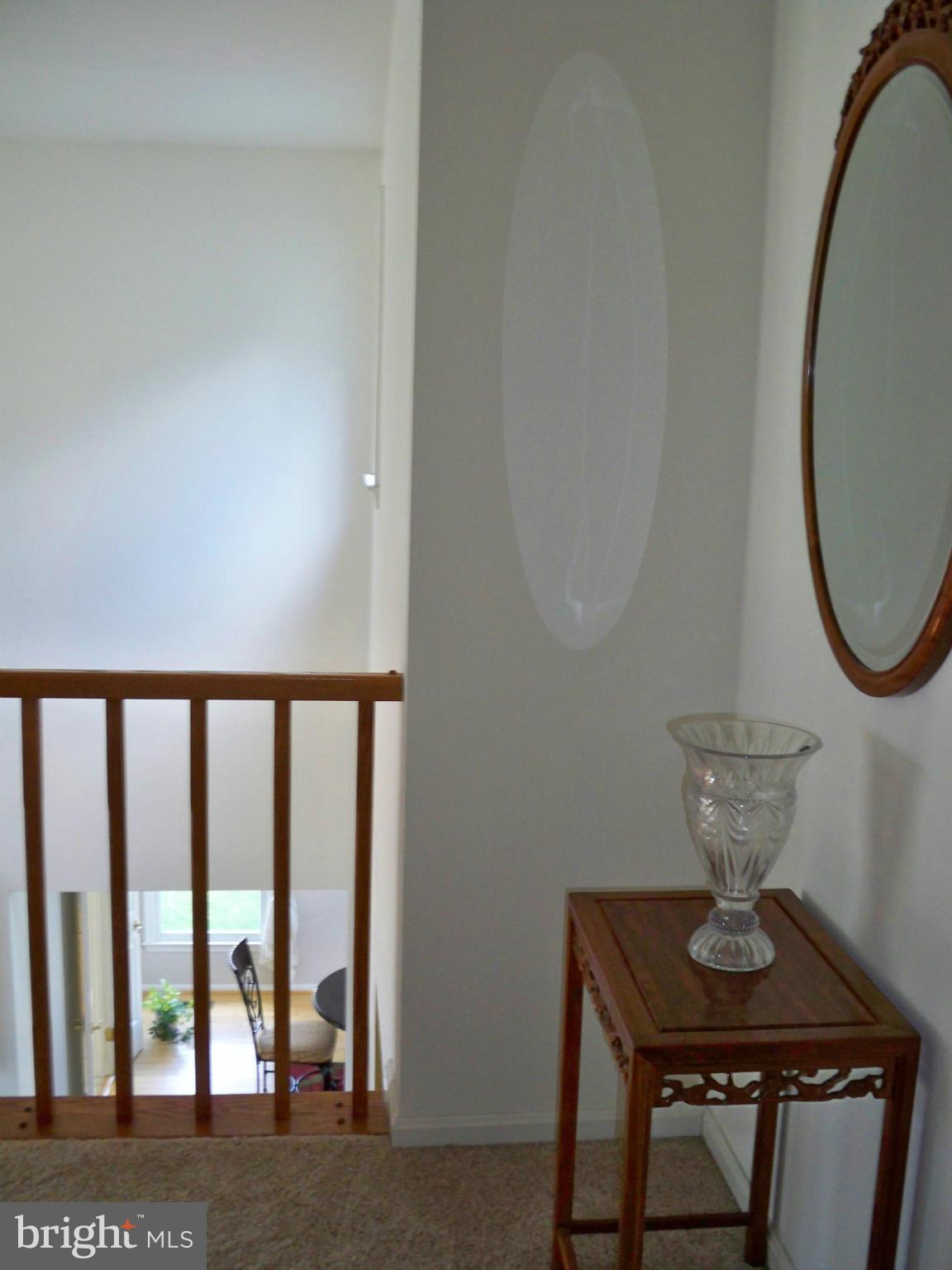14228 Summit Lane Laurel, MD 20708 - Photo 17 of 30 a view of a room with a table and chairs