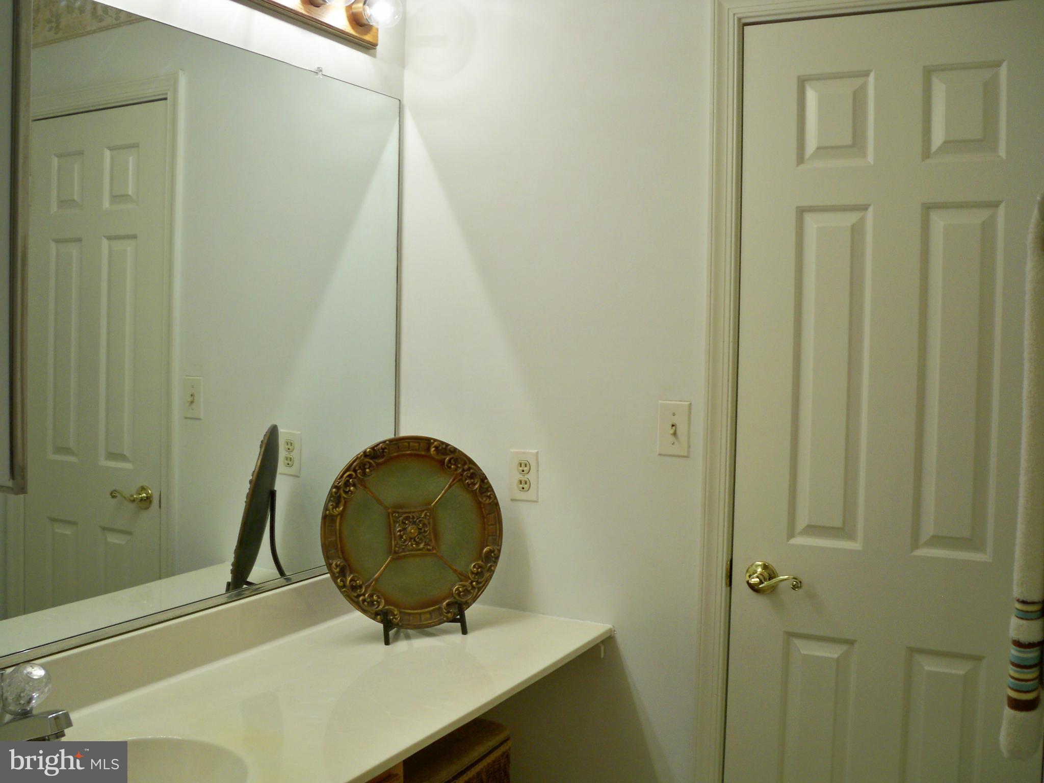 14228 Summit Lane Laurel, MD 20708 - Photo 19 of 30 a room with a sink