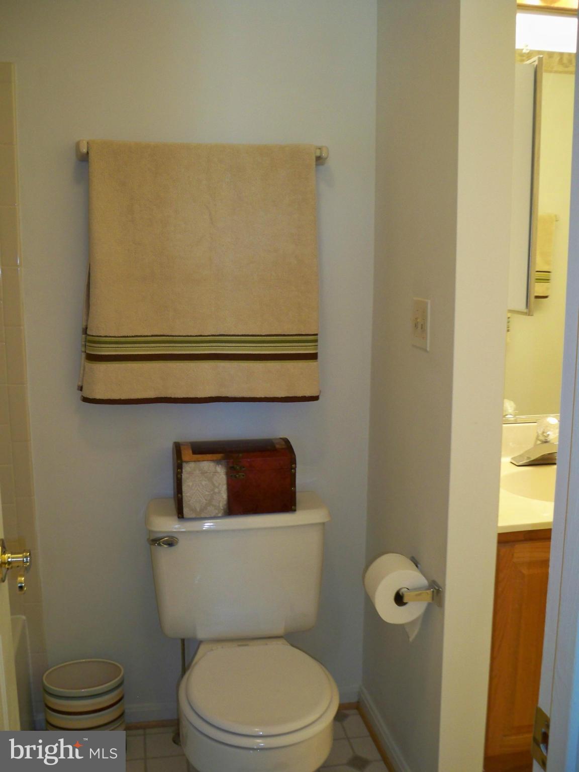 14228 Summit Lane Laurel, MD 20708 - Photo 20 of 30 a bathroom with a toilet and a sink