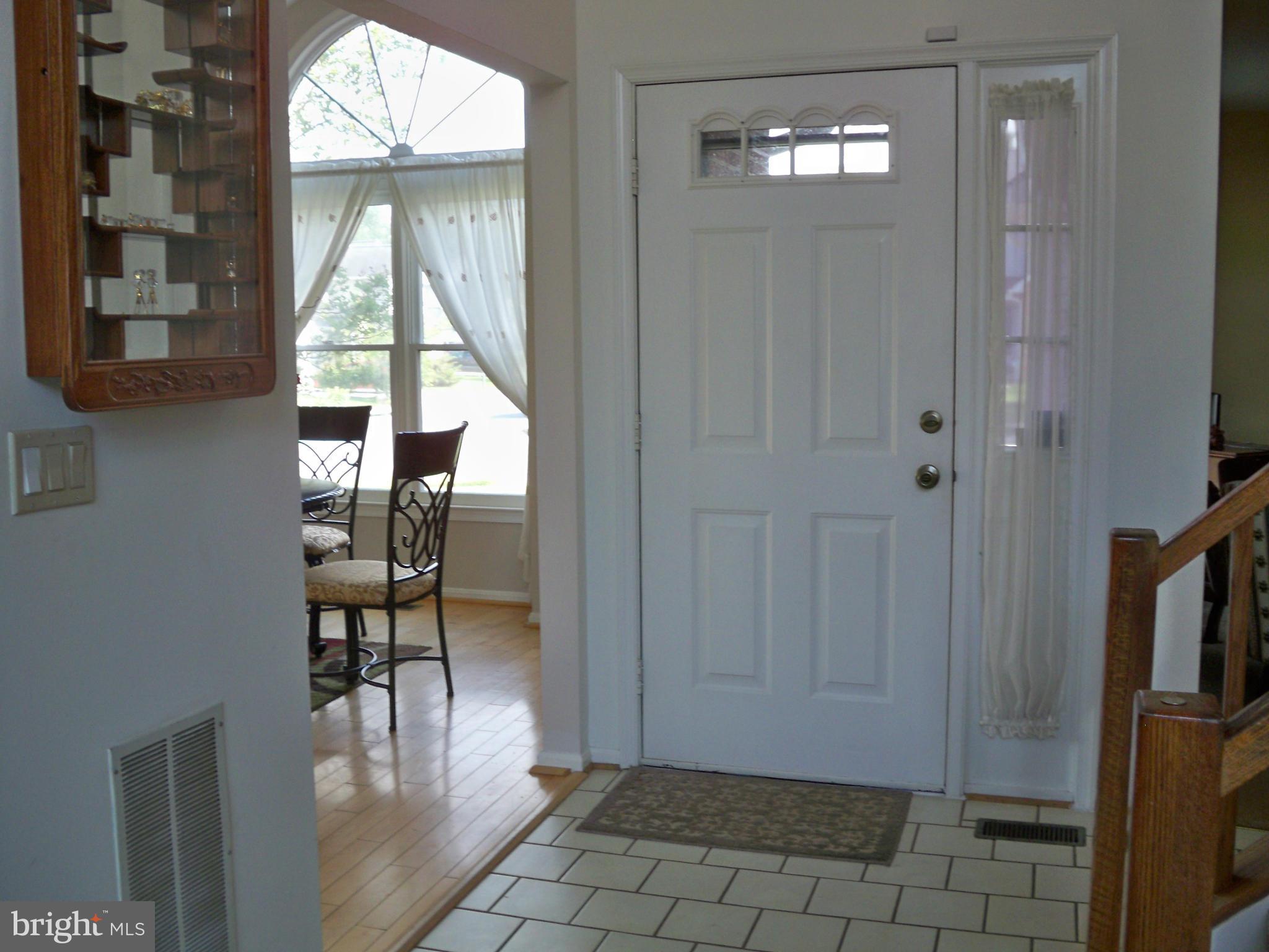 14228 Summit Lane Laurel, MD 20708 - Photo 3 of 30 a view of entryway with furniture and windows