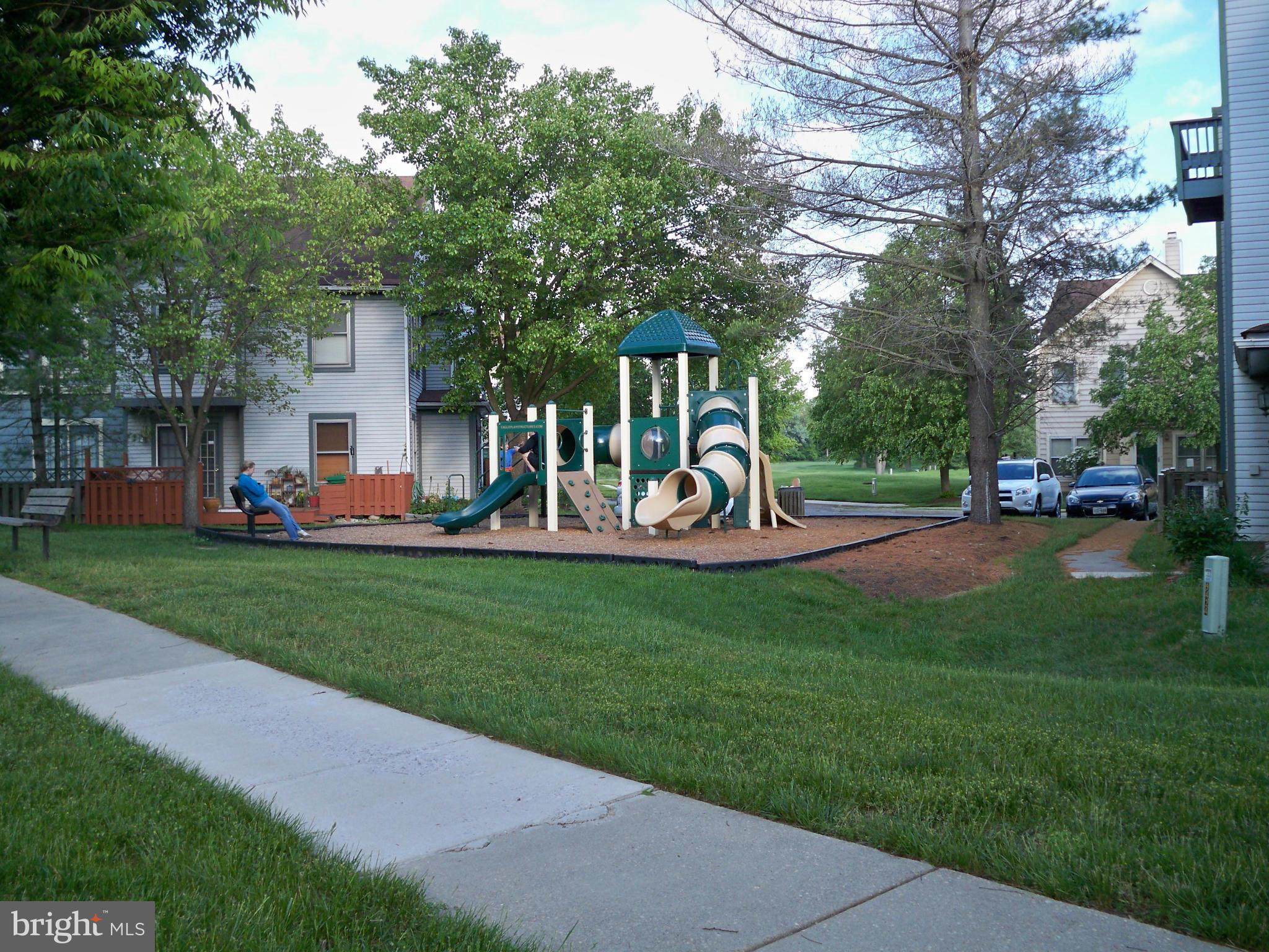 14228 Summit Lane Laurel, MD 20708 - Photo 29 of 30 a view of a park with swings and slides