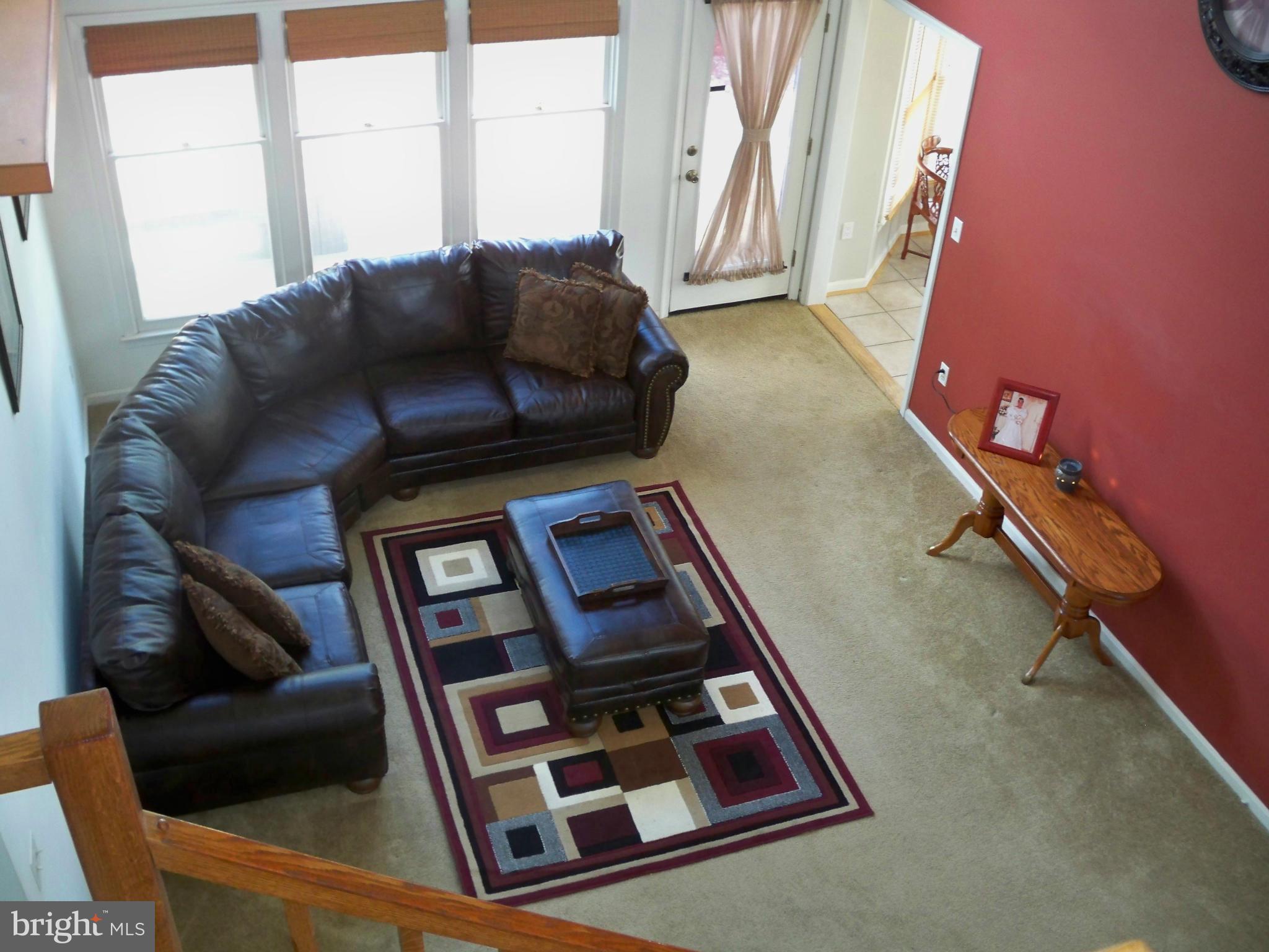 14228 Summit Lane Laurel, MD 20708 - Photo 5 of 30 a living room with furniture and a mirror
