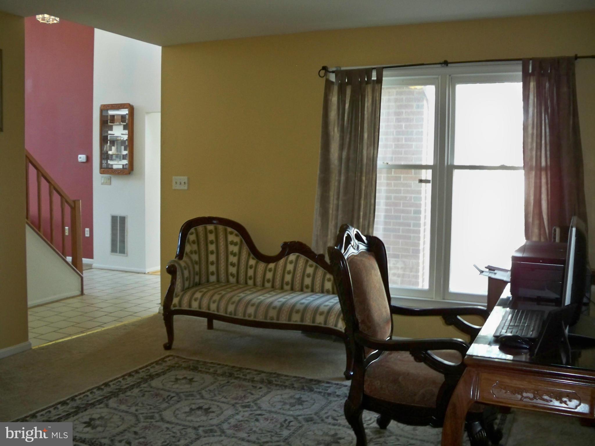 14228 Summit Lane Laurel, MD 20708 - Photo 10 of 30 a view of a workspace with furniture and a window