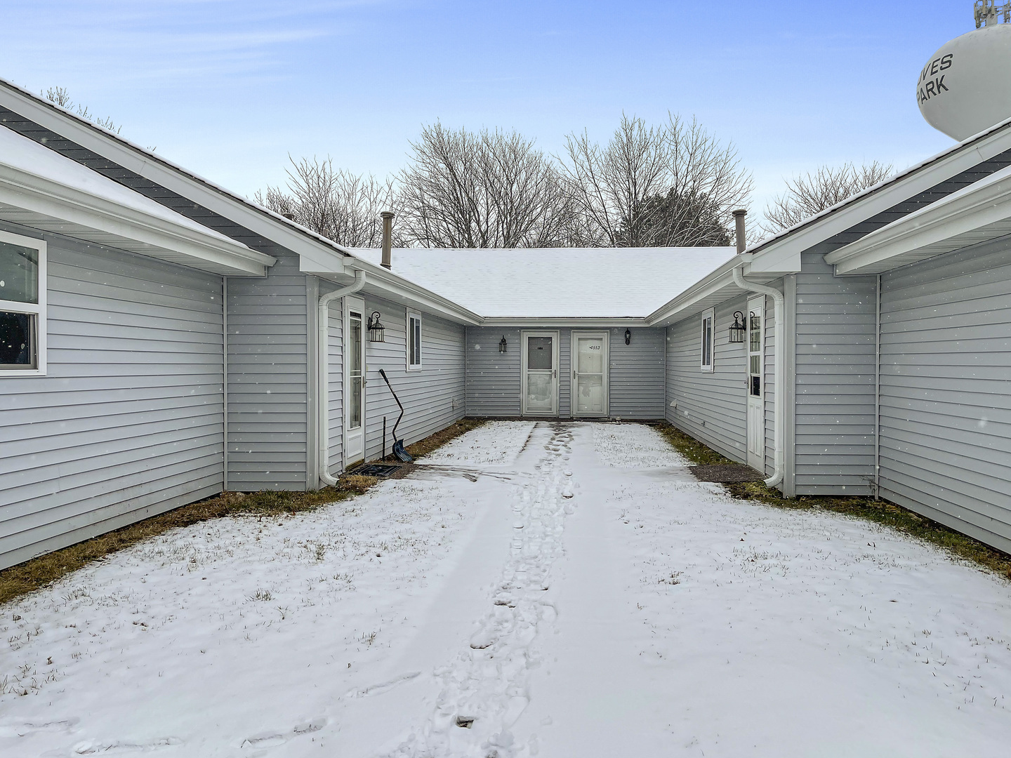 a view of a house with a garage