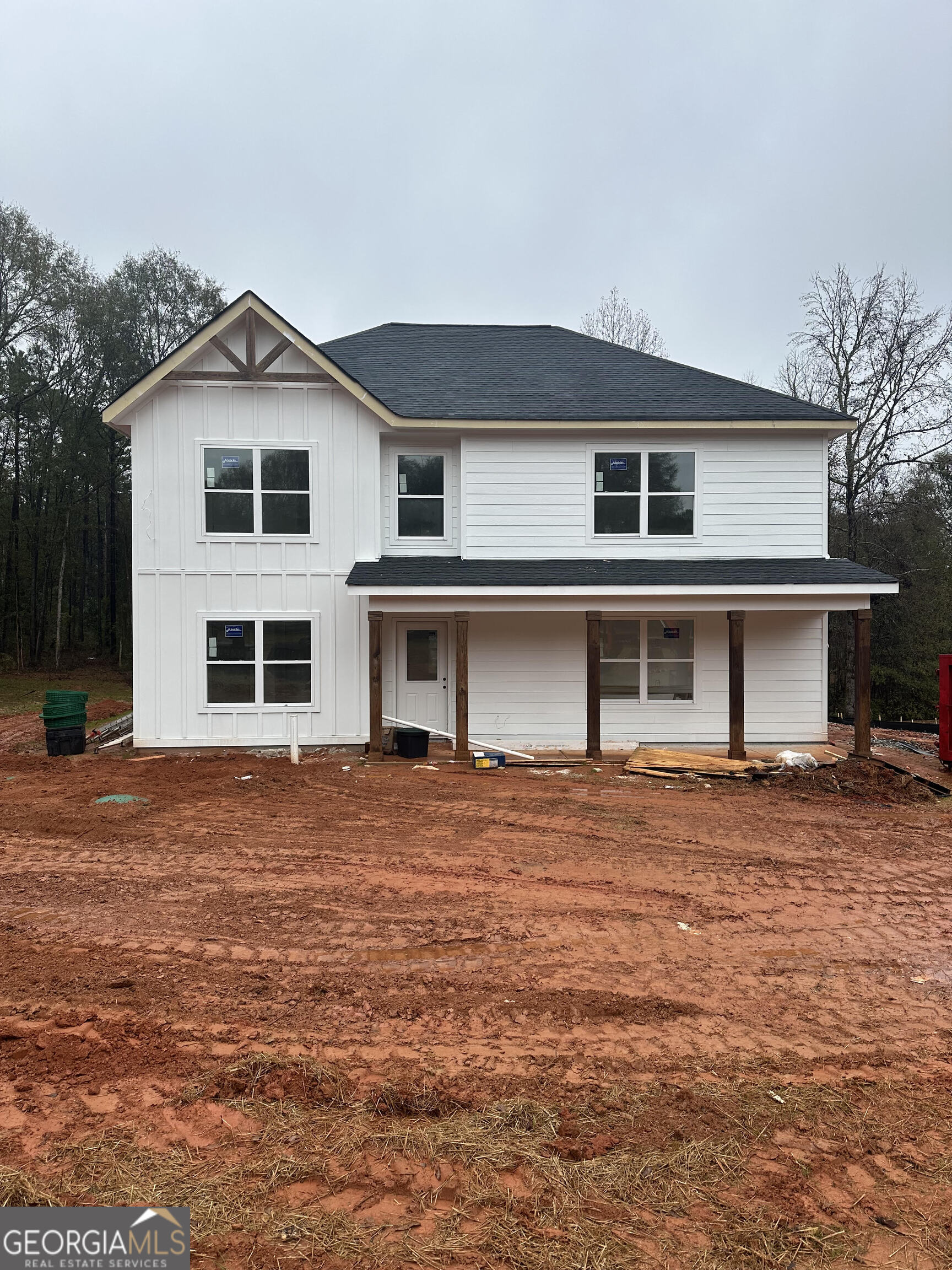 119 Kuhn Moore Road Locust Grove, GA 30248 - Photo 1 of 11 a front view of a house with a yard