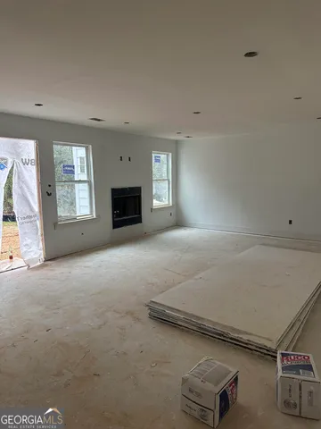 an empty room with windows