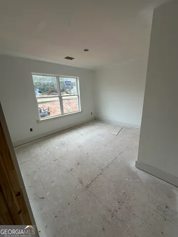 an empty room with windows