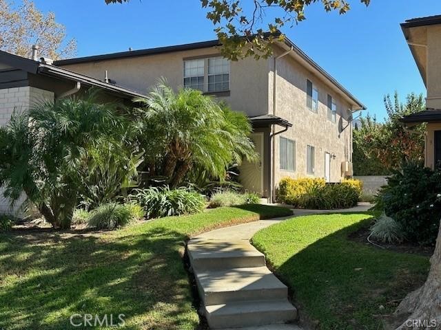 2070 Avenida Placida, Unit 3 Simi Valley, CA 93063 - Photo 1 of 25 a view of a yard in front of house