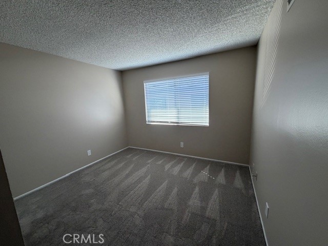 2070 Avenida Placida, Unit 3 Simi Valley, CA 93063 - Photo 12 of 25 an empty room with a window
