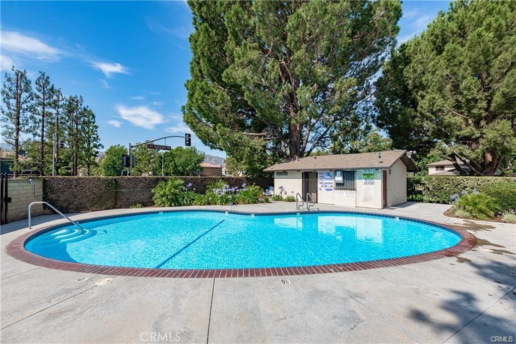 2070 Avenida Placida, Unit 3 Simi Valley, CA 93063 - Photo 24 of 25 a view of swimming pool with seating space