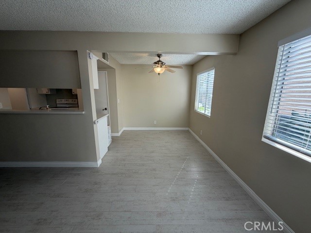 2070 Avenida Placida, Unit 3 Simi Valley, CA 93063 - Photo 5 of 25 an empty room with windows and cabinet