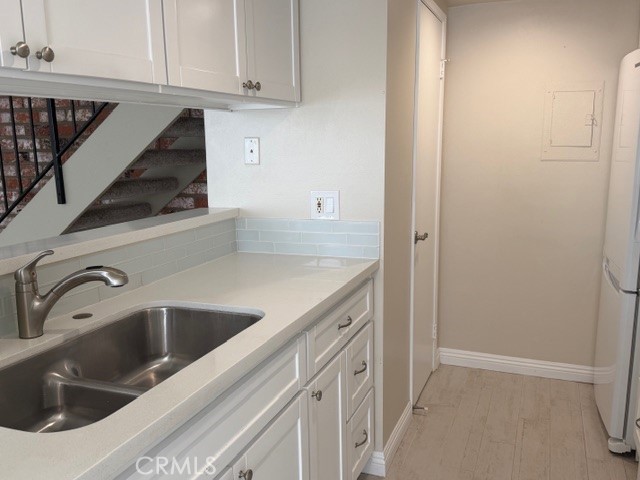 2070 Avenida Placida, Unit 3 Simi Valley, CA 93063 - Photo 7 of 25 a view white cabinets and a sink