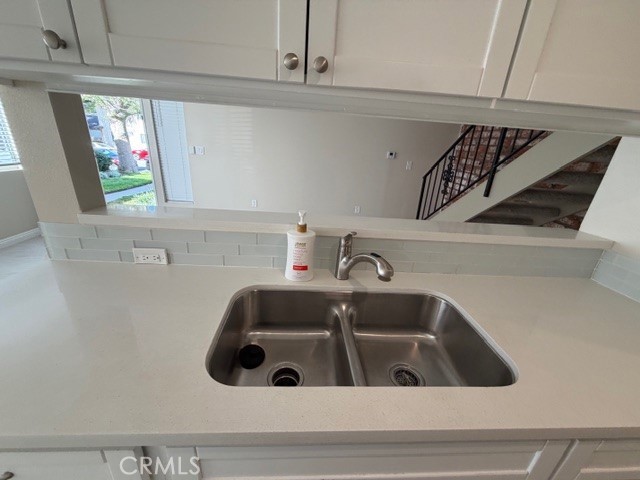 2070 Avenida Placida, Unit 3 Simi Valley, CA 93063 - Photo 8 of 25 a bathroom with a sink and mirror