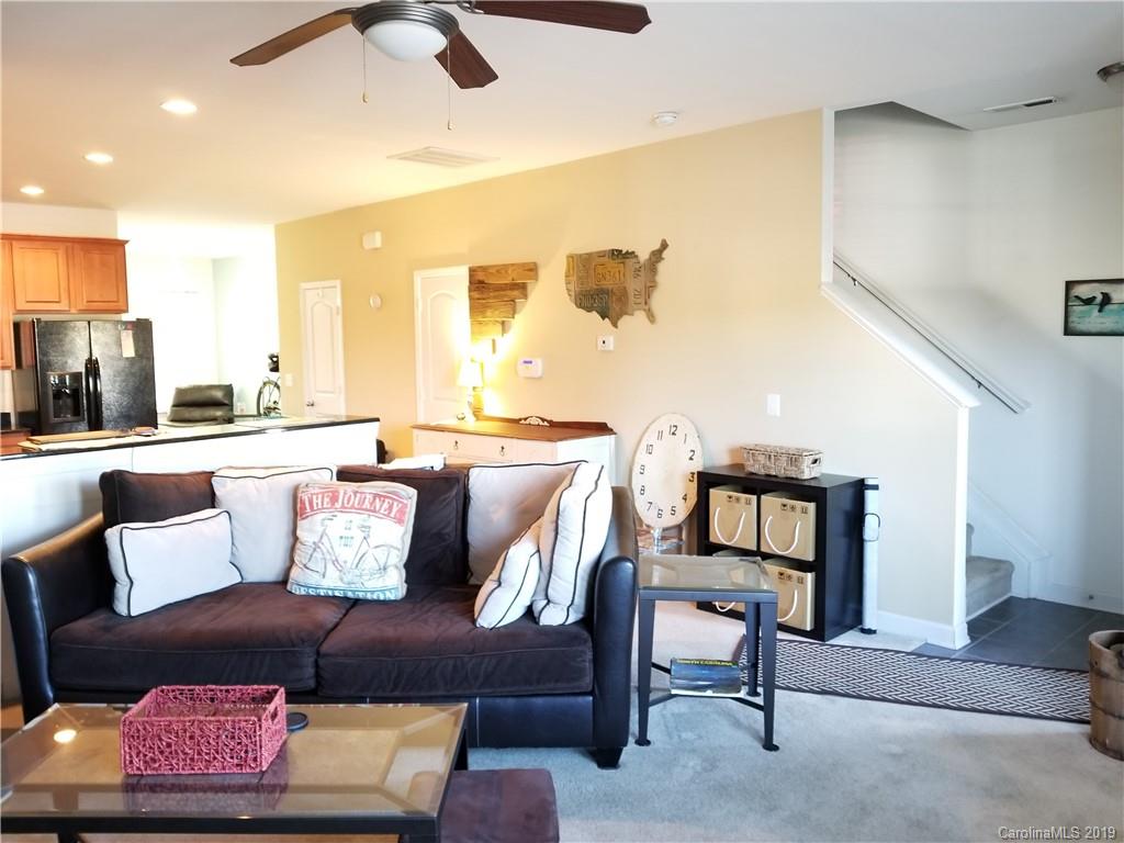 5655 Stafford Road Charlotte, NC 28215 - Photo 5 of 13 a living room with furniture and a potted plant