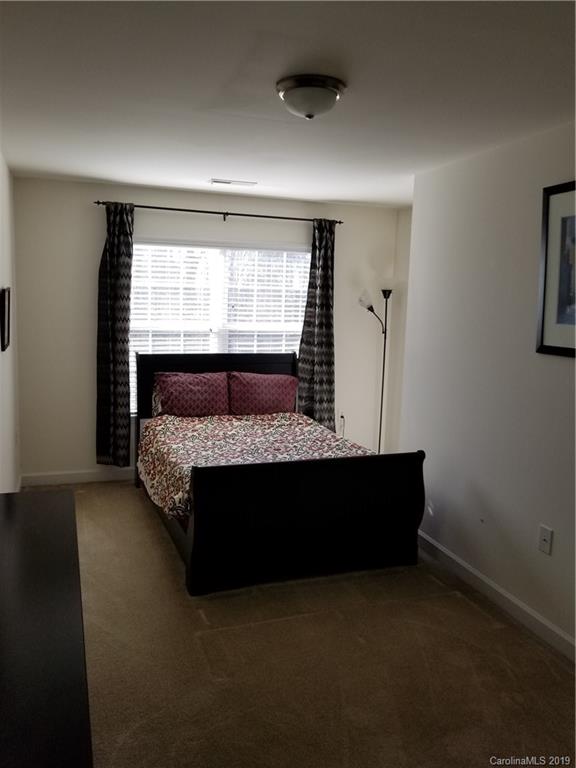 5655 Stafford Road Charlotte, NC 28215 - Photo 10 of 13 a room with furniture and a window