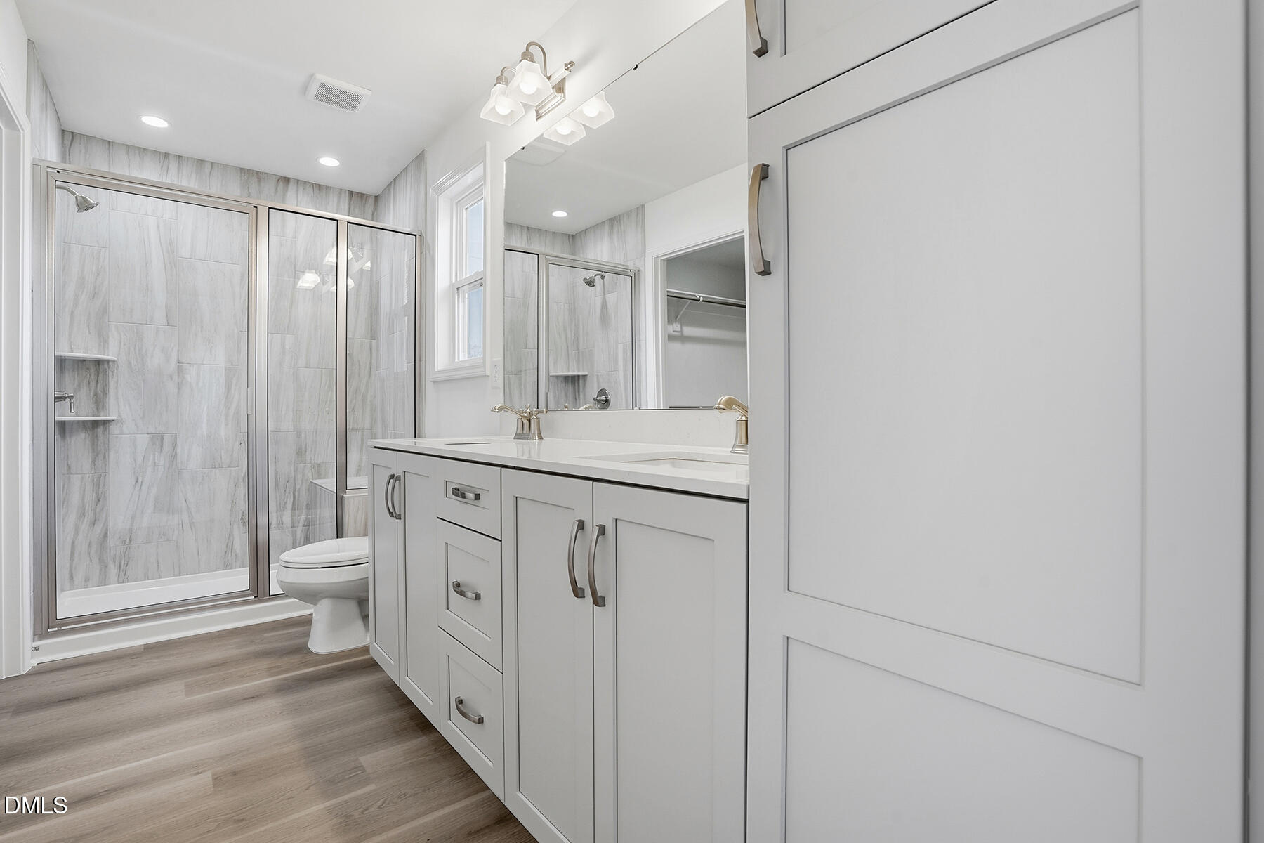 218 Rae Street Warsaw, NC 28398 - Photo 19 of 31 a spacious bathroom with a double vanity sink a toilet and a shower