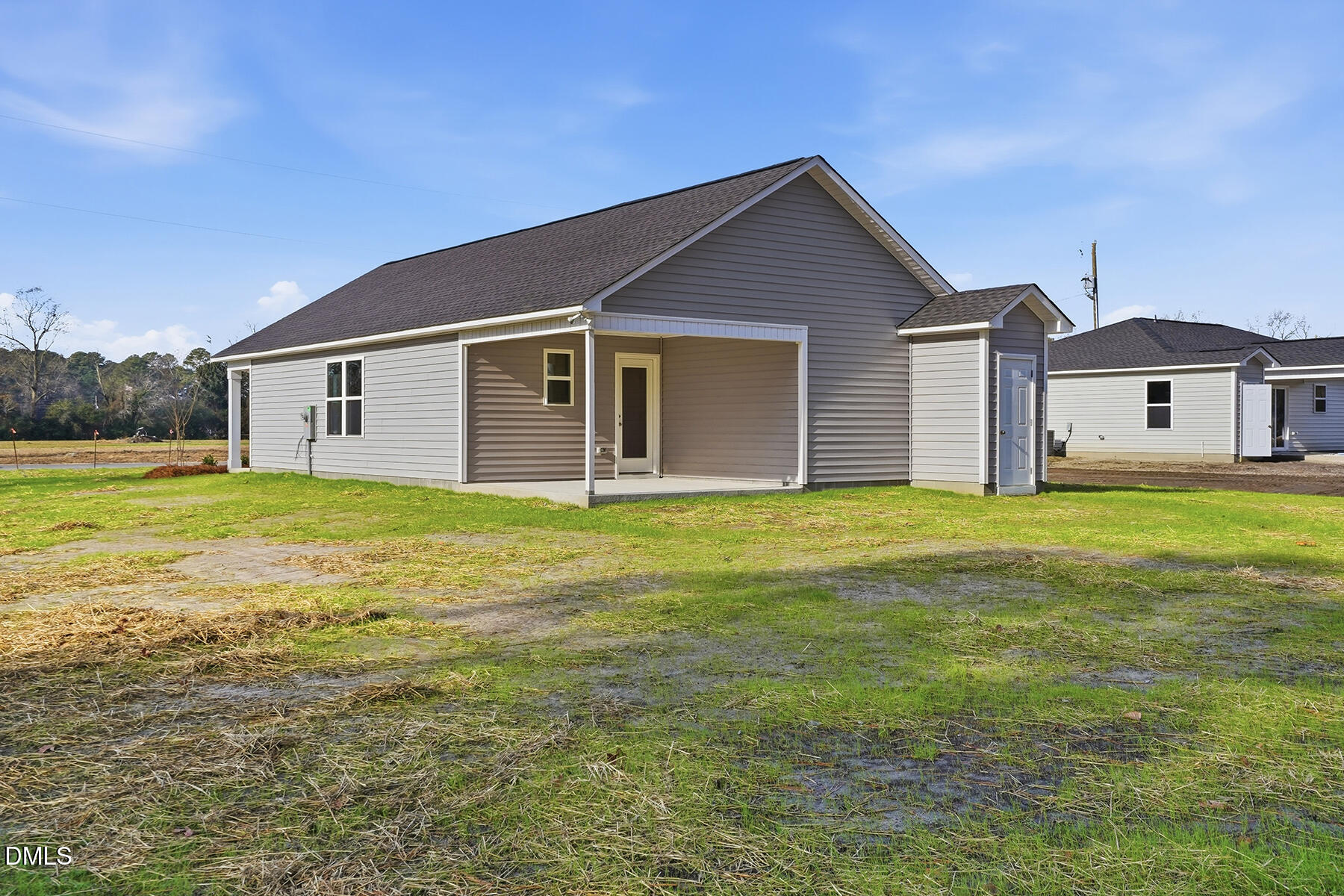 218 Rae Street Warsaw, NC 28398 - Photo 28 of 31 a front view of house with yard and porch