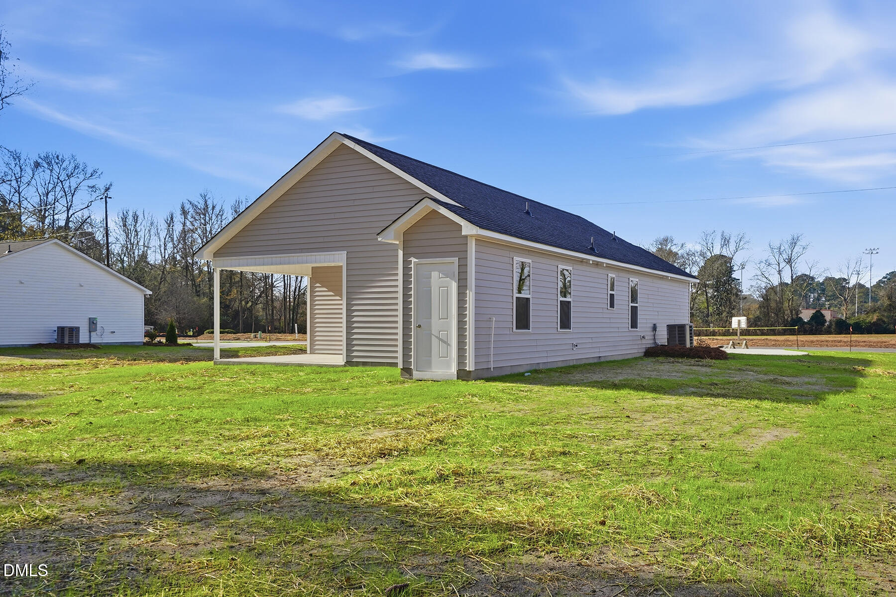 218 Rae Street Warsaw, NC 28398 - Photo 30 of 31 a view of a house with a yard