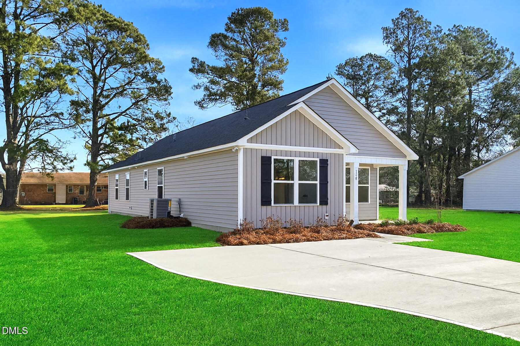 218 Rae Street Warsaw, NC 28398 - Photo 3 of 31 a front view of a house with a yard