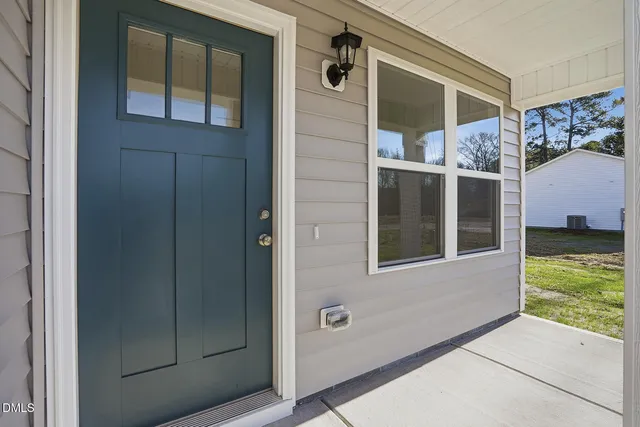 a view of a house with a porch