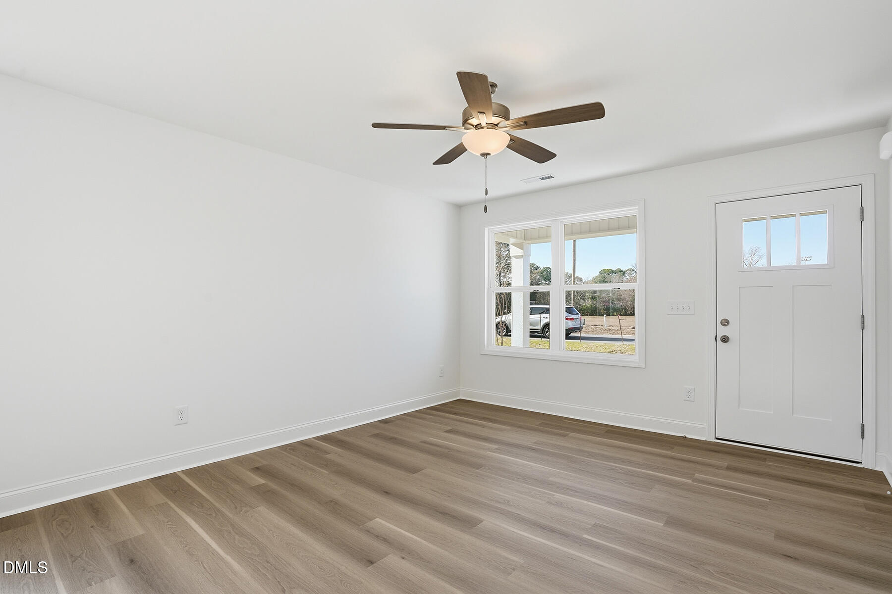 218 Rae Street Warsaw, NC 28398 - Photo 8 of 31 a view of an empty room and window