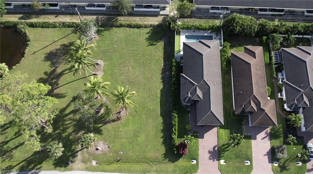 Linda Drive Naples, FL 34112 - Photo 2 of 7 an aerial view of residential houses with outdoor space