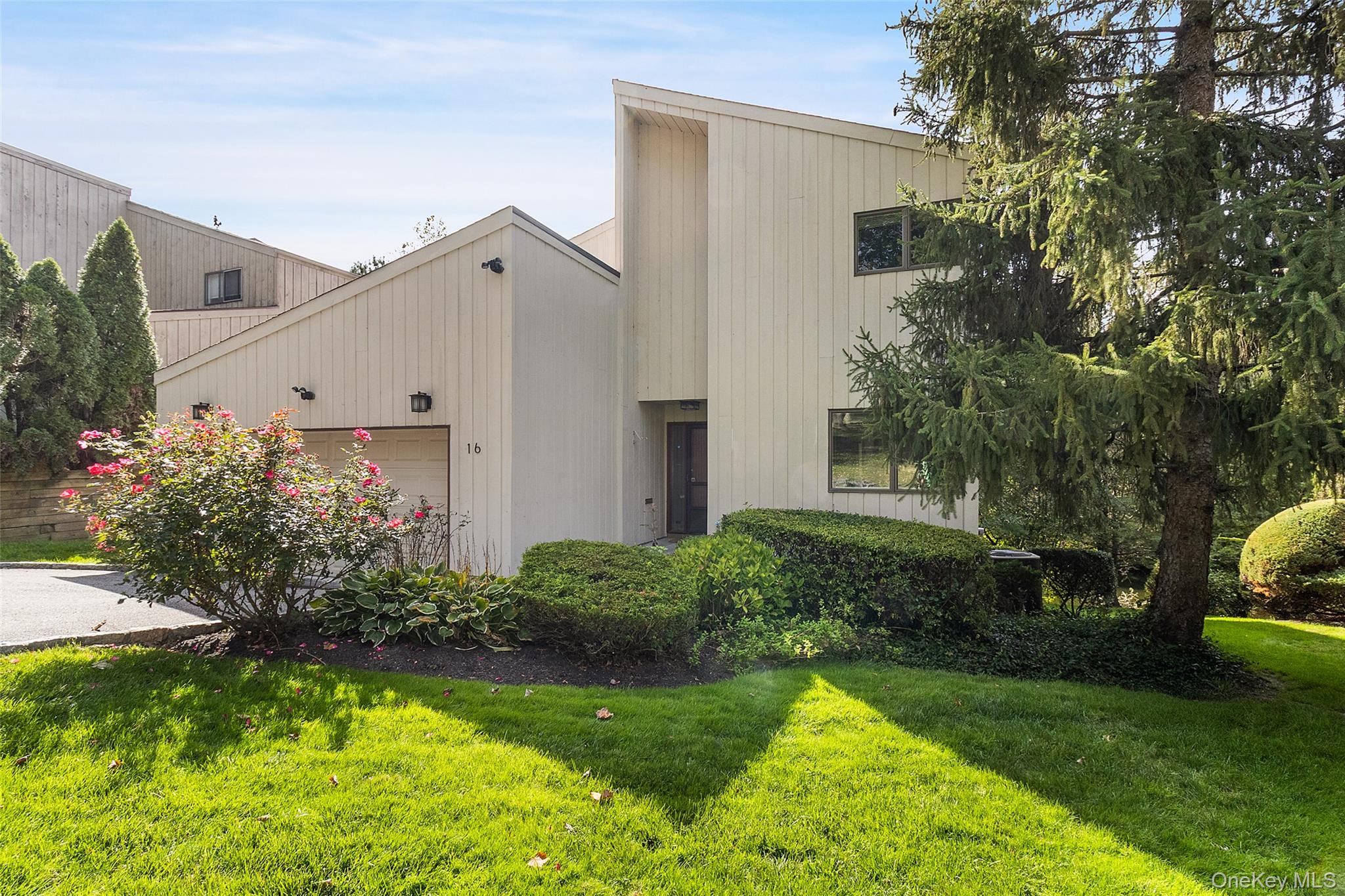 16 Talcott Road Rye Brook, NY 10573 - Photo 1 of 1 a view of a house with a yard and plants
