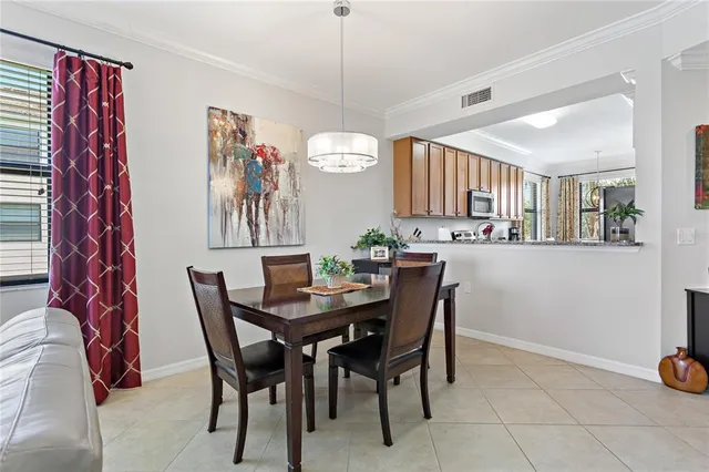 a bedroom with a bed and a lamp