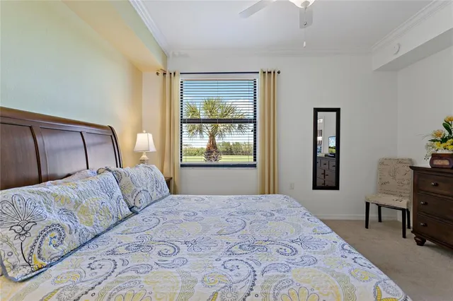 a bathroom with a sink mirror vanity and toilet