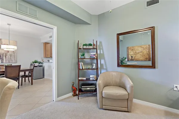 a bedroom with a bed and a table in it