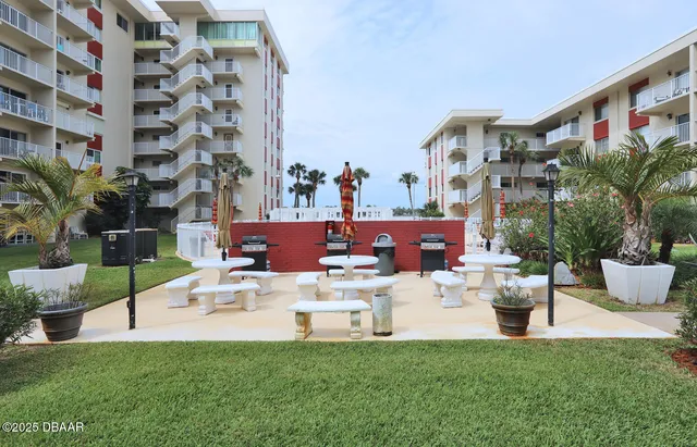 a view of pool table and chairs