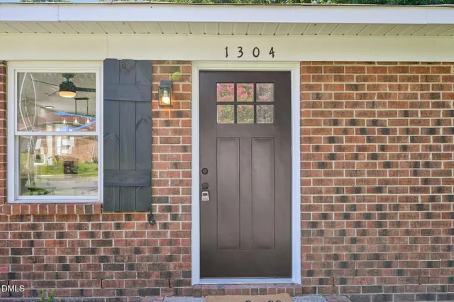 a view of front door of house and window