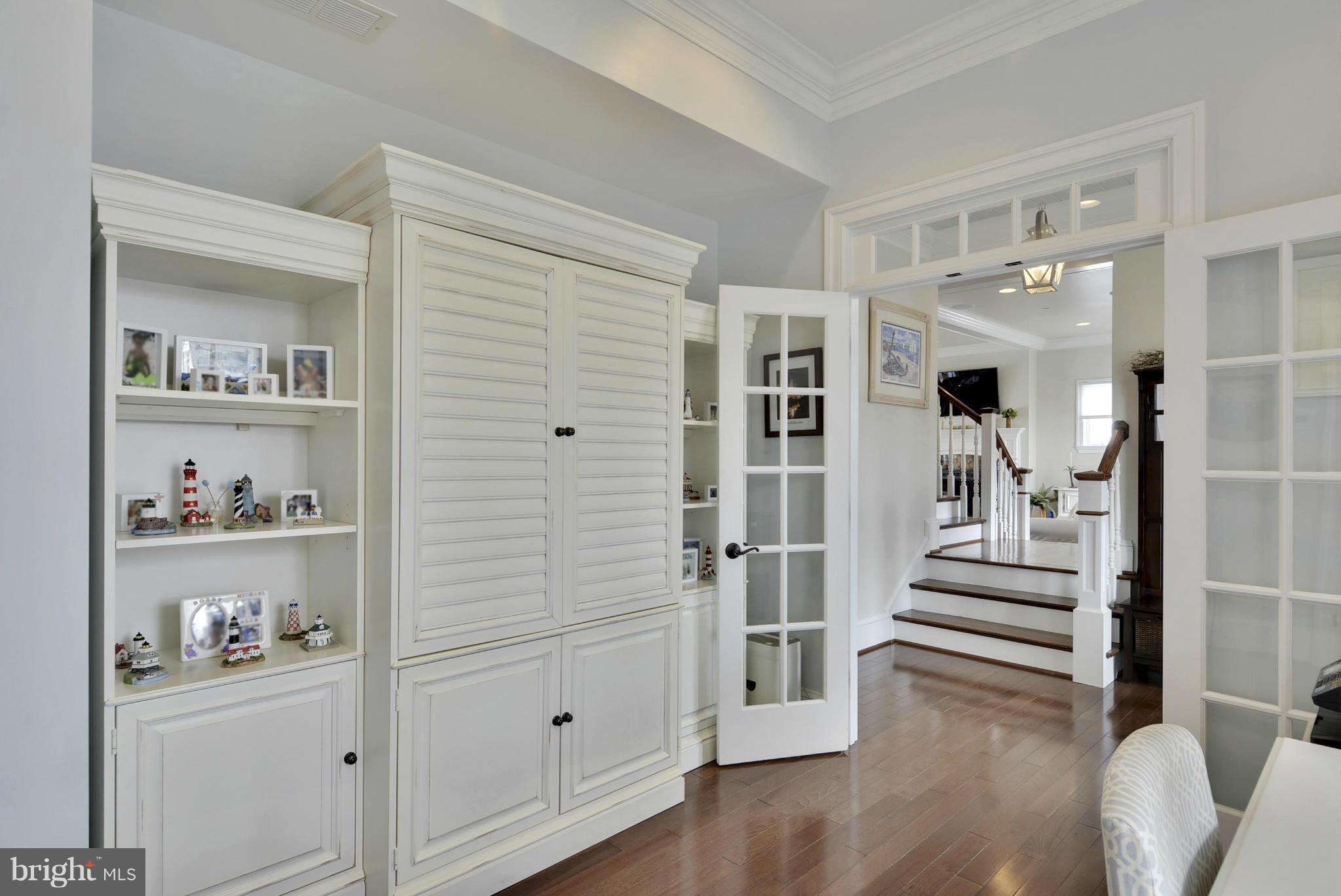 1824 Wilson Point Road Baltimore, MD 21220 - Photo 19 of 28 a view of a hallway with closet and wooden floor