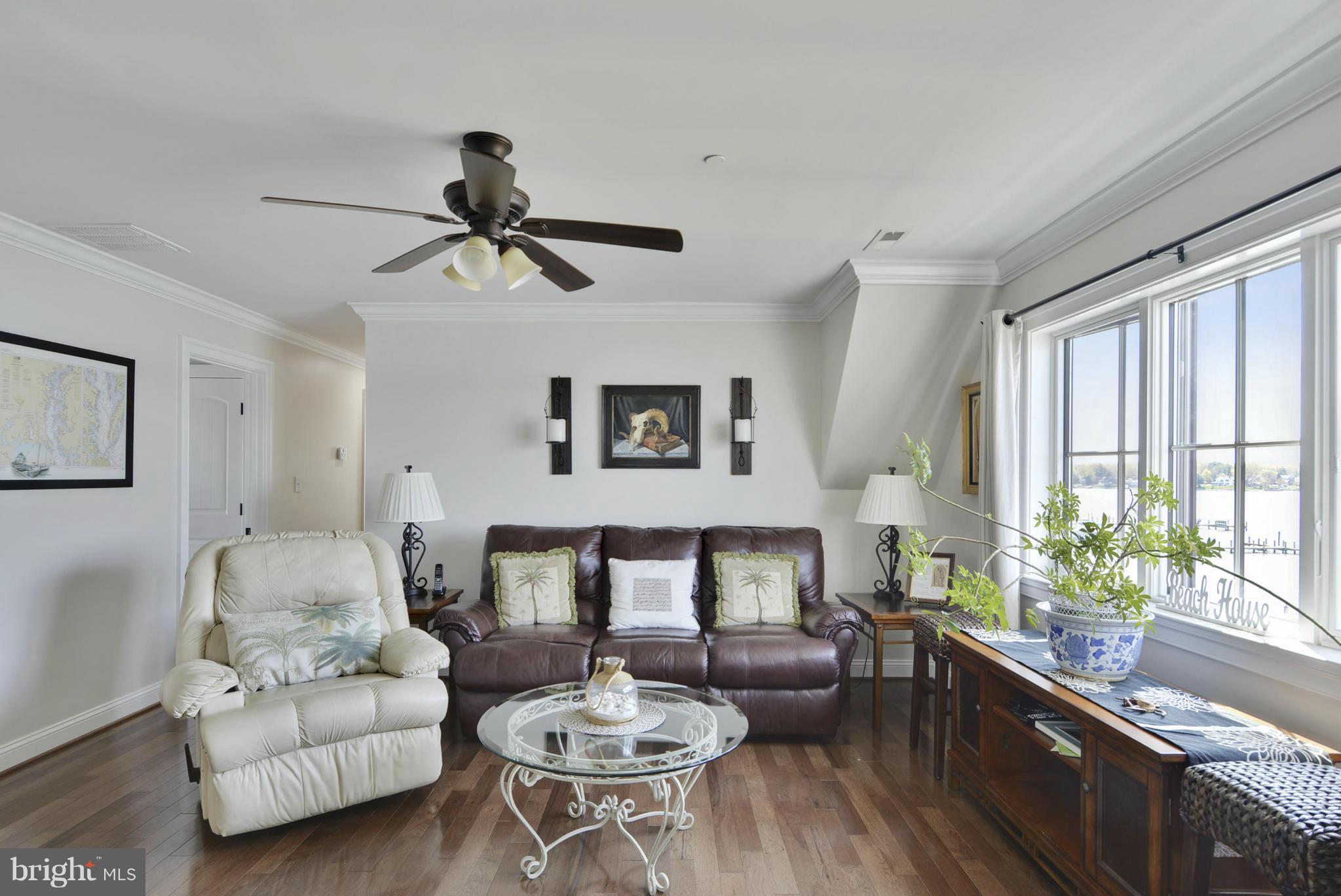 1824 Wilson Point Road Baltimore, MD 21220 - Photo 21 of 28 a living room with furniture and a large window