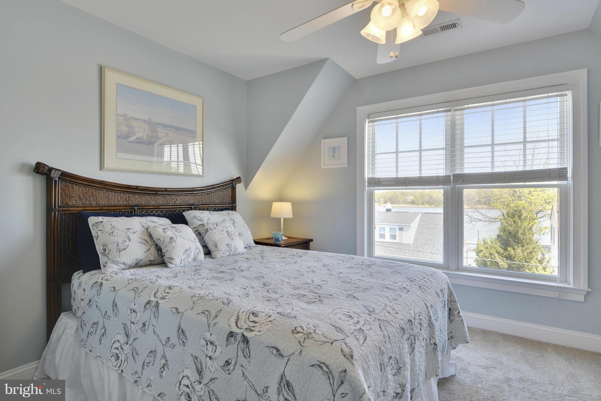 1824 Wilson Point Road Baltimore, MD 21220 - Photo 24 of 28 a bedroom with a large bed and a window