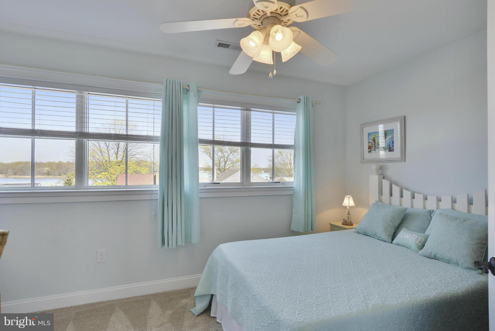 1824 Wilson Point Road Baltimore, MD 21220 - Photo 25 of 28 a bedroom with a large bed and a window