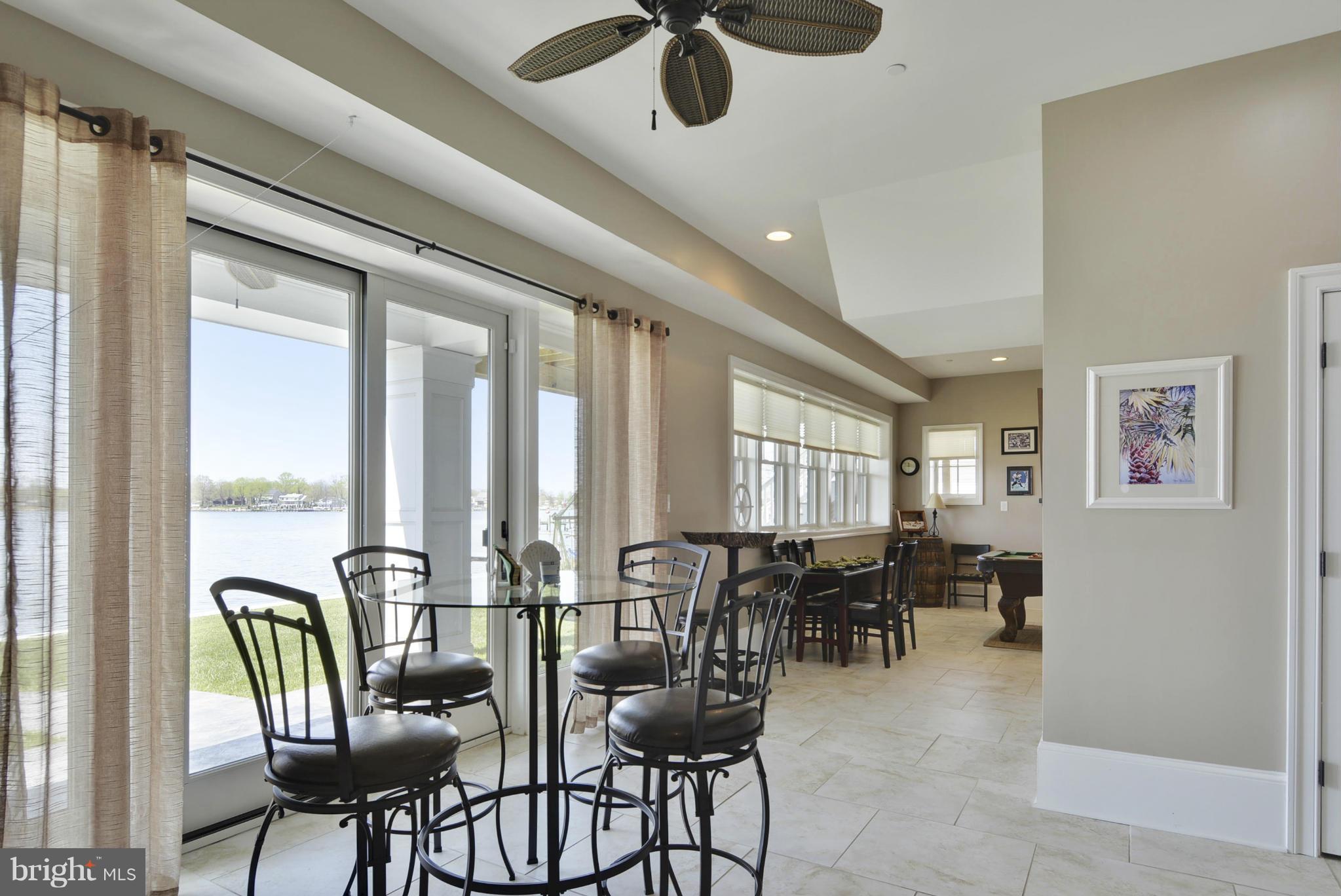 1824 Wilson Point Road Baltimore, MD 21220 - Photo 5 of 28 a dining room with furniture window and outside view