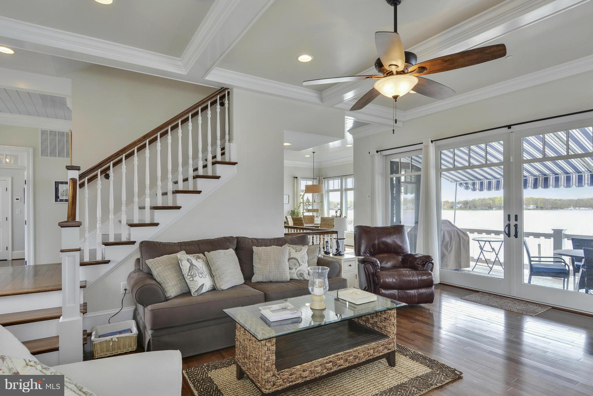 1824 Wilson Point Road Baltimore, MD 21220 - Photo 7 of 28 a living room with furniture ceiling fan and a large window