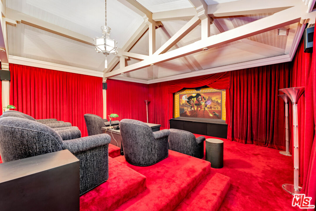 3405 Fryman Road Studio City, CA 91604 - Photo 11 of 28 a bedroom with furniture and a flat screen tv